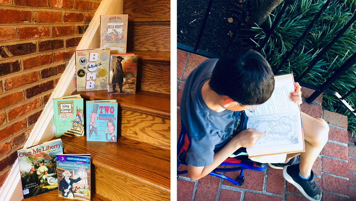 Staircase displaying nonfiction children's books and young boy reading outside during the summer