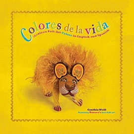 the yellow cover of Colores de la Vida the yellow cover of Colores de la Vida showing a lion figure.