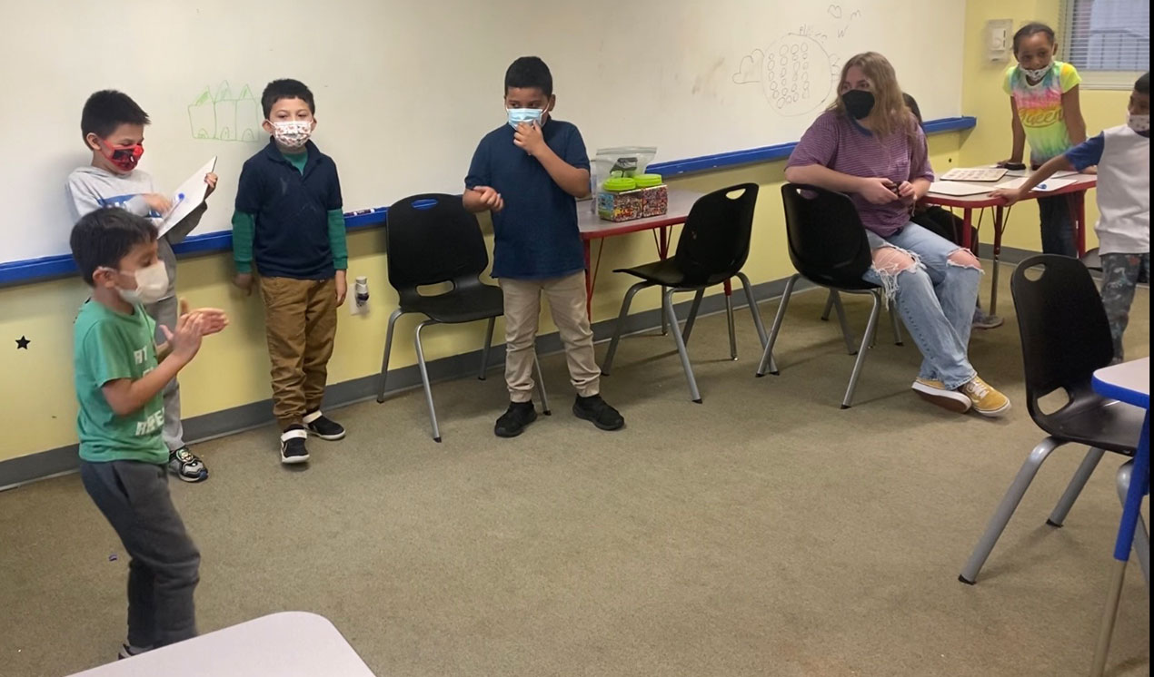 Young kids practicing beat boxing