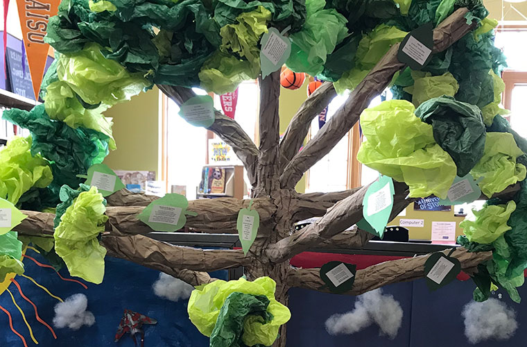 Tree made out of cardboard tubes and tissue paper