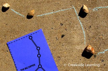 a constellation drawn in chalk and rocks