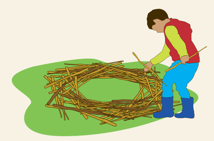 child aking giant nest with sticks