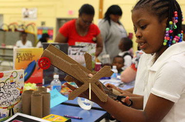 children making robots out of cardboard
