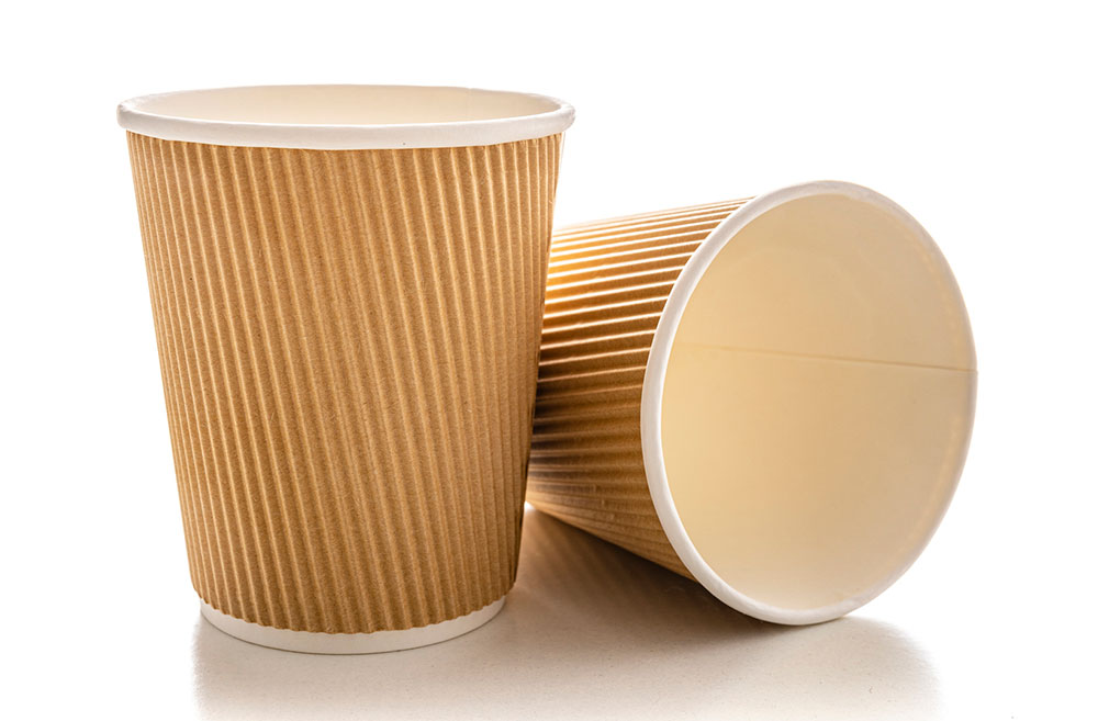 two plain brown paper cups