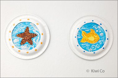 photo of paper plates decorated to look like potholes