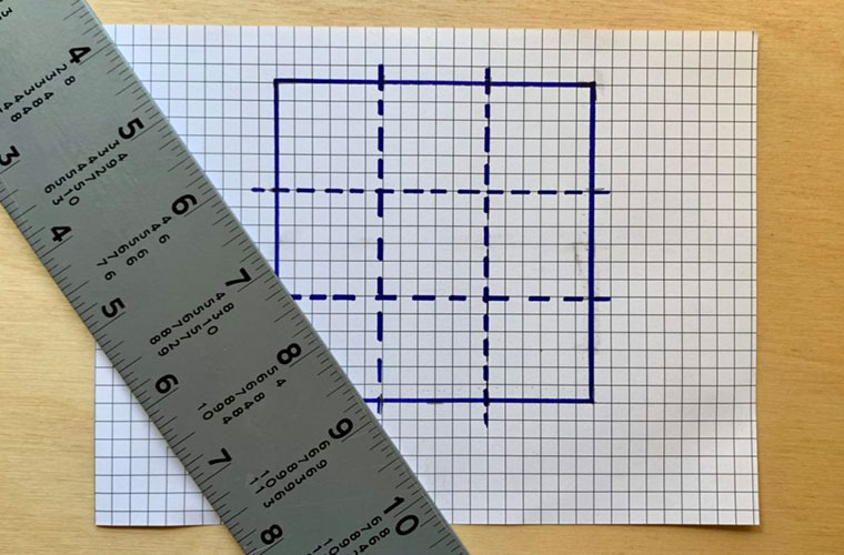 square grid on graph paper with ruler