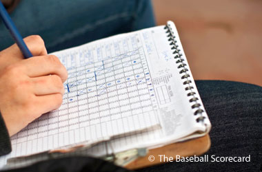 someone filling out a scorecard