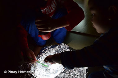 photo of kids doing an experiment