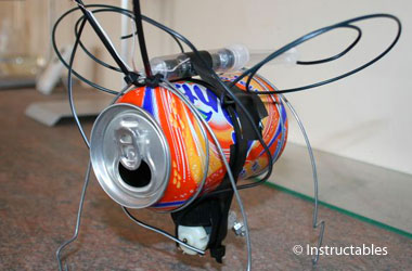 photo of a soda can made to look like a bug with wings