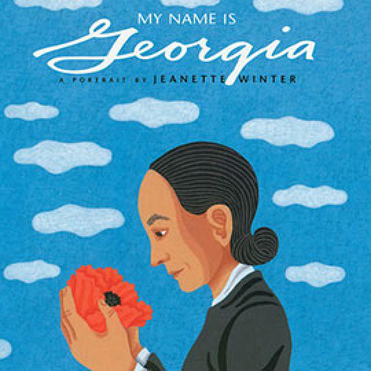 illustrated cover of My Name is Georgia showing a dark-haired girl looking down at orange flower in her hand.