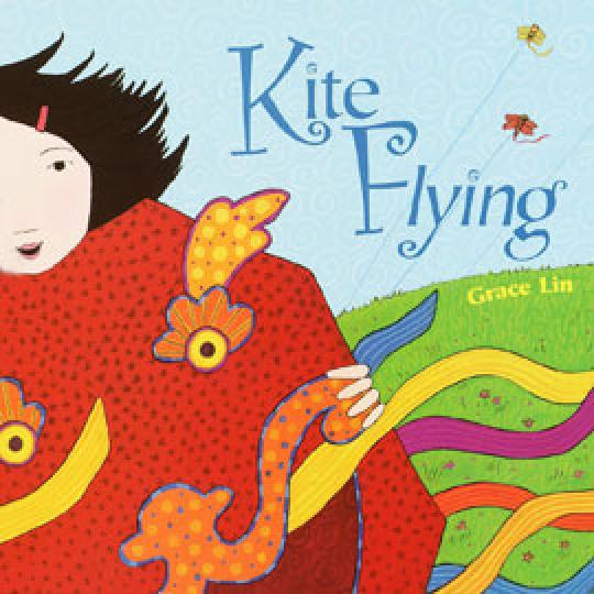 illustrated cover of "Kite Flying" showing child running with a dragon kite