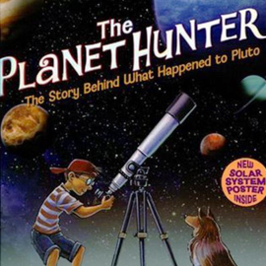 cover of "The Planet Hunter" showing boy looking through telescope