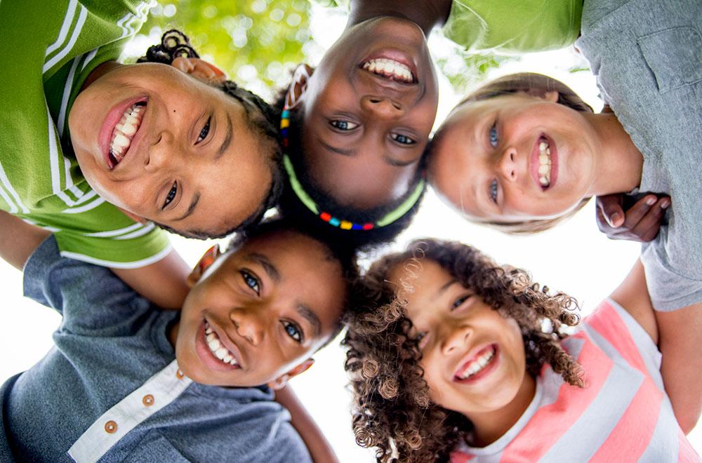 turtle-eye view of group of diverse young children